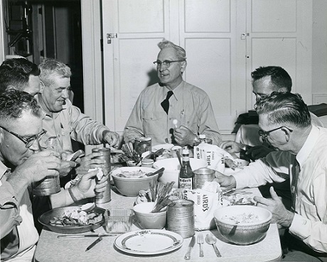 Men Eating at Table