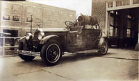 Fire Department truck in front of Fire Station, no date, station not identified