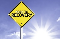 Road to recovery sign