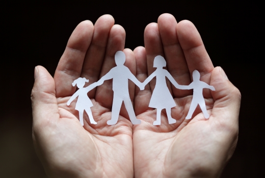 Hands with family paper cut out