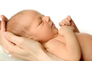 Newborn baby in Mom's hands