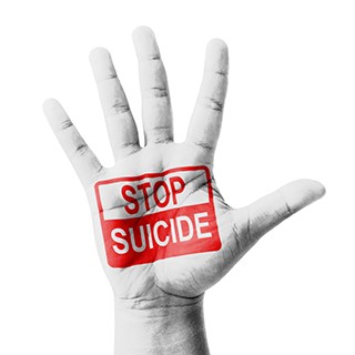 Open hand raised, Stop Suicide sign painted, multi purpose concept - isolated on white background